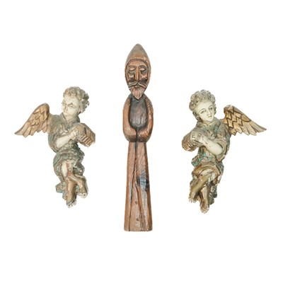 Lot 116 - A pair of wood carved painted gesso putti.