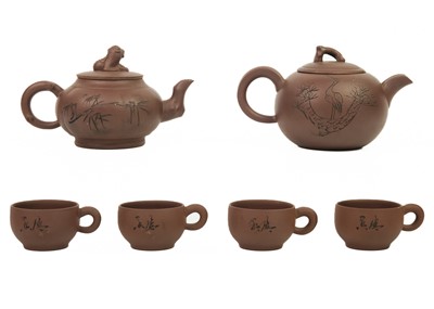 Lot 138 - A Chinese Yixing pottery teapot.