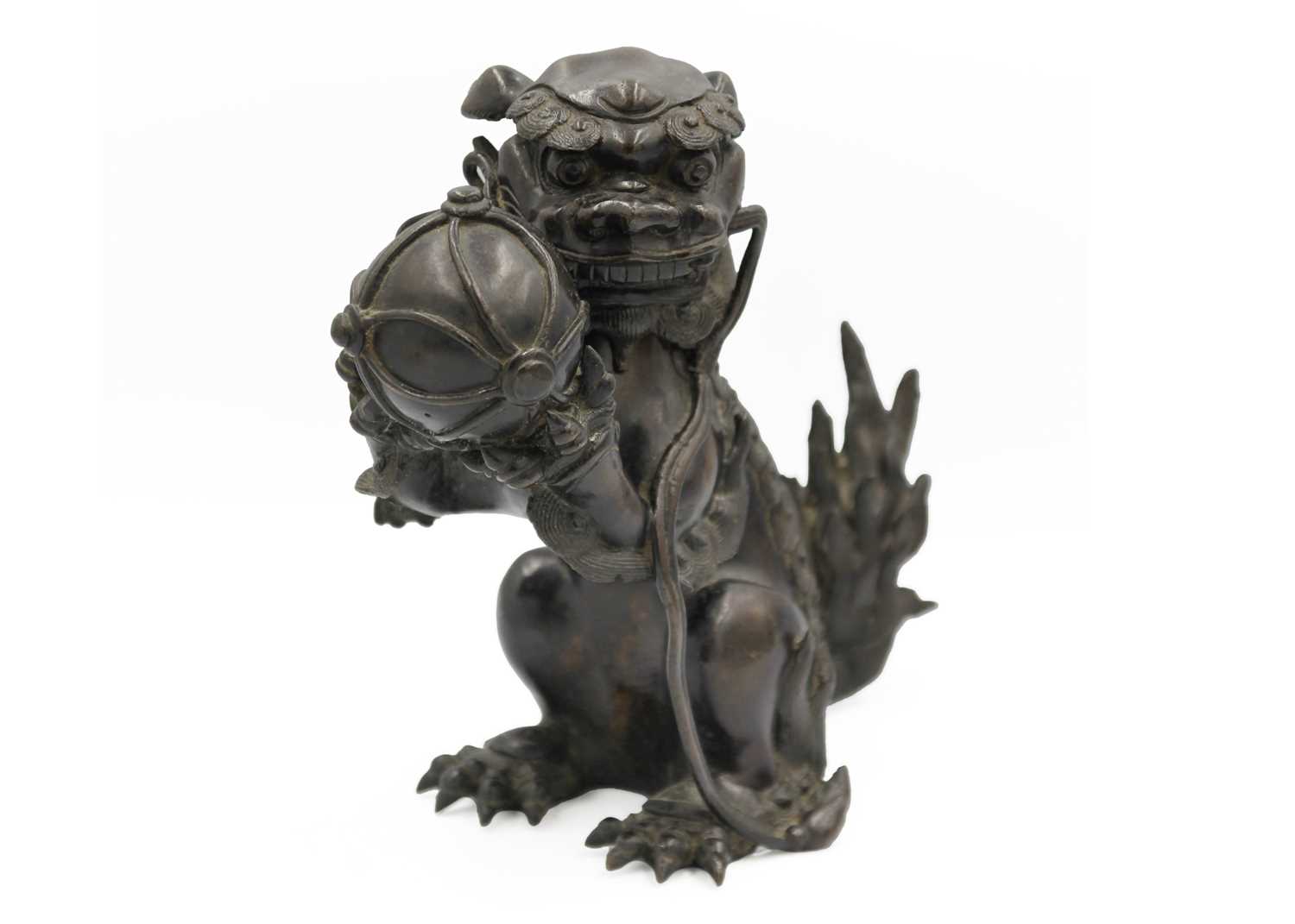 Lot 141 - A Chinese bronze 'lion dog' incense burner, Qing Dynasty, 19th century.