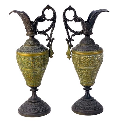 Lot 209 - A pair of gilt brass ewers circa 1900.