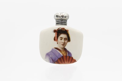 Lot 126 - A silver lidded ceramic scent bottle decorated with a Geisha girl.