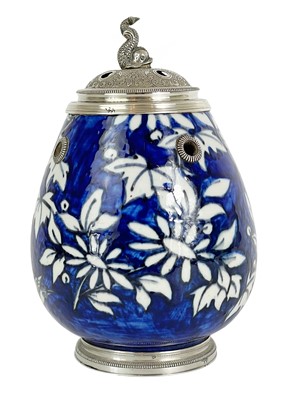 Lot 75 - A Persian pottery and silver mounted pot, early 20th century.