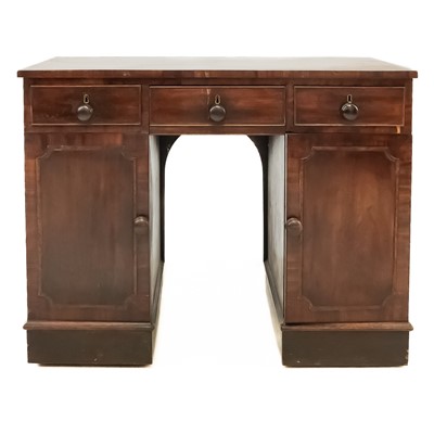 Lot 636 - A George III mahogany kneehole sideboard.