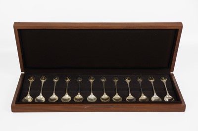 Lot 86 - A cased set of twelve silver RSPB spoons by John Pinches Ltd.