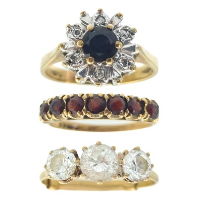 Lot 77 - Three 9ct gem set rings.