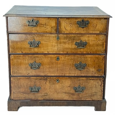 Lot 335 - A George II walnut and ash banded chest.