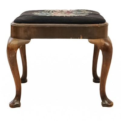 Lot 565 - A George II walnut stool.