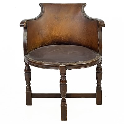 Lot 31 - A Victorian walnut and leather elbow chair.