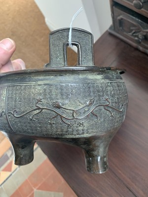 Lot 21 - A Chinese bronze censer, late Ming Dynasty.