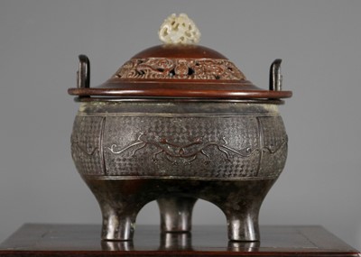 Lot 21 - A Chinese bronze censer, late Ming Dynasty.