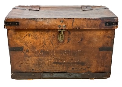 Lot 325 - A late 19th century leather metal bound carriage trunk.