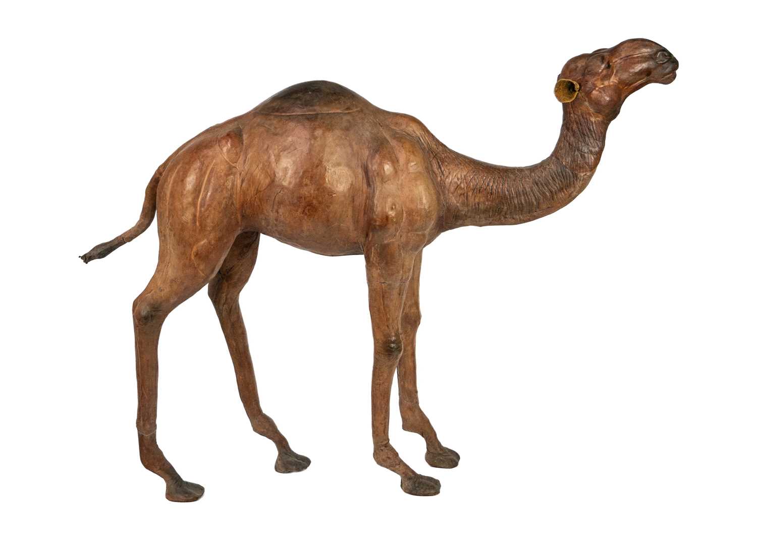 Lot 227 - A large leather model of a camel.