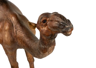 Lot 227 - A large leather model of a camel.