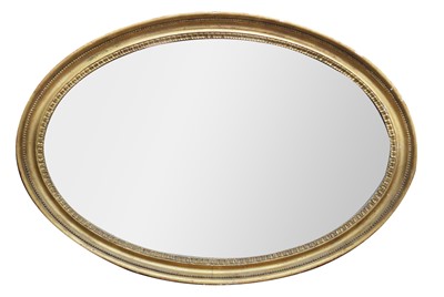 Lot 37 - A 19th century oval gilt gesso mirror.