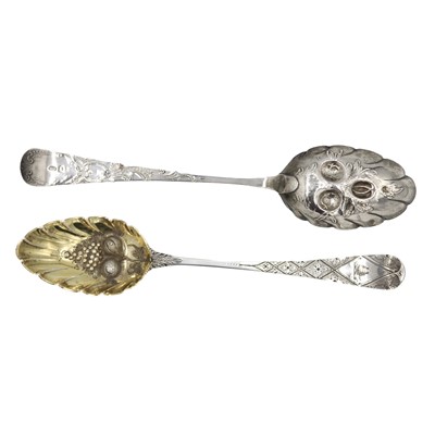 Lot 73 - A matched pair of Georgian silver berry spoons.