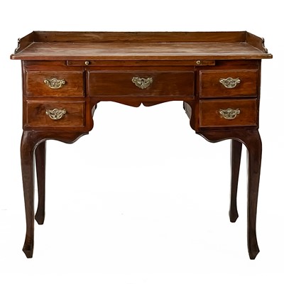 Lot 294 - A French provincial walnut tray top dressing table or lowboy.