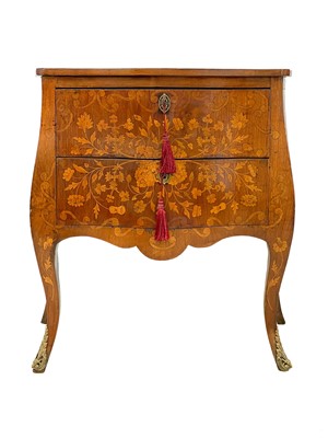 Lot 121 - A French marquetry inlaid mahogany petit commode.