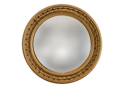 Lot 135 - A circular gilt gesso small convex wall mirror.