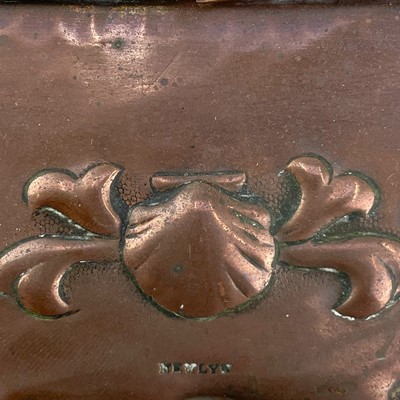 Lot 14 - A Newlyn copper four section hanging letter rack.