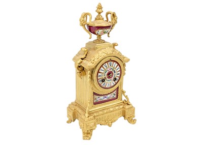 Lot 379 - A French gilt spelter clock garniture.