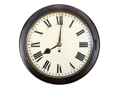 Lot 384 - A G.P.O EIIR circular wall clock.