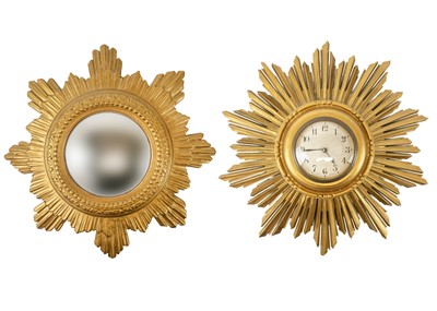 Lot 378 - A Starburst giltwood wall clock.