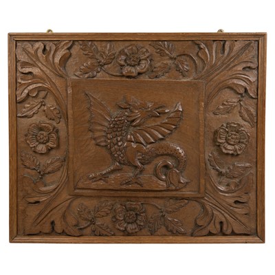 Lot 54 - A rectangular carved walnut panel.