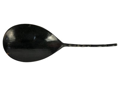 Lot 209 - A Chinese black stained carved wood ladle, early-mid 20th century.