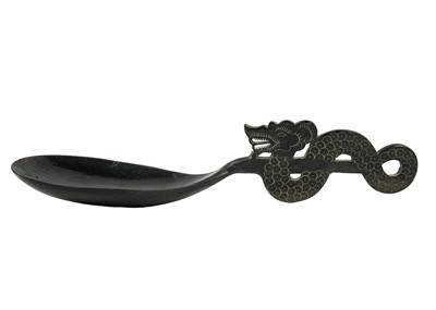 Lot 209 - A Chinese black stained carved wood ladle, early-mid 20th century.