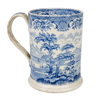 Lot 31 - Four blue and white printed porter mugs.