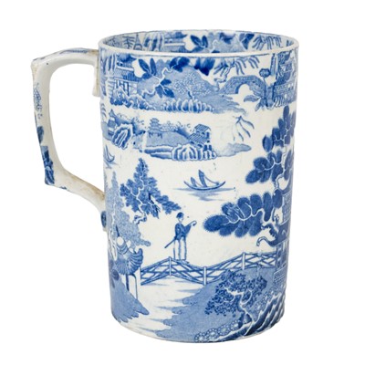 Lot 31 - Four blue and white printed porter mugs.