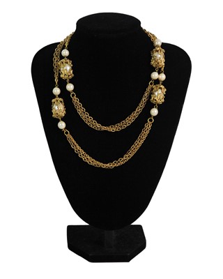 Lot 79 - A Chanel gold-plated faux pearl sautoir neck chain, circa 1940's.