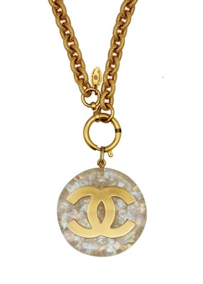 Lot 5 - A Chanel 24ct gold-plated CC and opalescent resin medallion necklace, circa 1990/91.