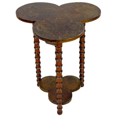 Lot 44 - An early 20th century two tier trefoil poker work table.