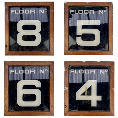 Lot 181 - Four mid 20th century teak frame lift floor signs.