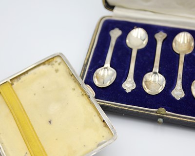Lot 96 - A silver engine turned cigarette case by Bravingtons Ltd.