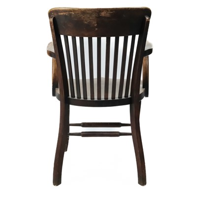 Lot 308 - An early 20th century walnut elbow chair.