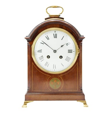 Lot 367 - A Georgian style mahogany and inlaid bracket clock.