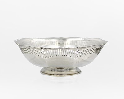 Lot 88 - A George V pedestal silver fruit bowl by James Dixon & Sons.