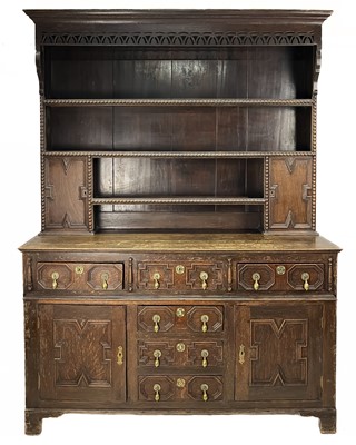 Lot 112 - An oak dresser.