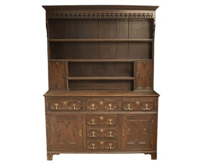 Lot 699 - An oak dresser.