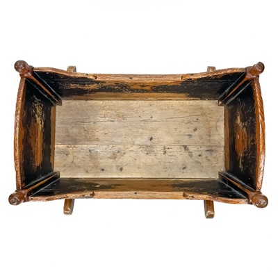 Lot 193 - A continental green painted pine cradle.