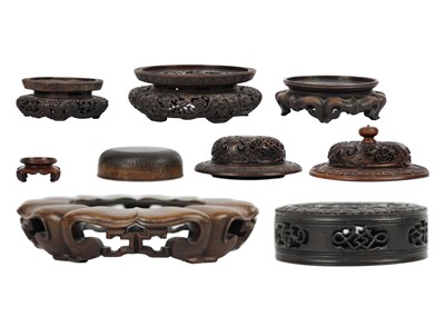 Lot 34 - Various Chinese carved wood stands and covers, 19th/20th century.