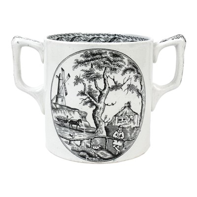 Lot 392 - A late 19th century pottery twin handled loving cup by George Hobson.