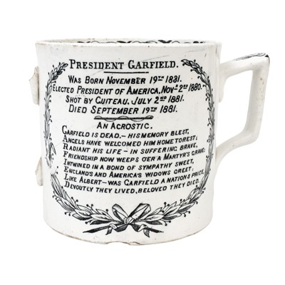 Lot 392 - A late 19th century pottery twin handled loving cup by George Hobson.