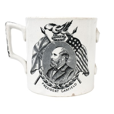Lot 392 - A late 19th century pottery twin handled loving cup by George Hobson.