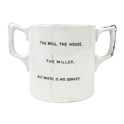 Lot 392 - A late 19th century pottery twin handled loving cup by George Hobson.