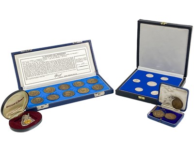 Lot 230 - Rhodesia boxed historical silver, silver coloured and bronze medallions.