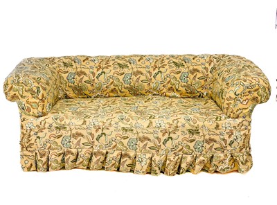 Lot 112 - A Victorian oak frame upholstered Chesterfield settee.