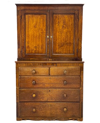 Lot 624 - A 19th century oak estate cabinet.